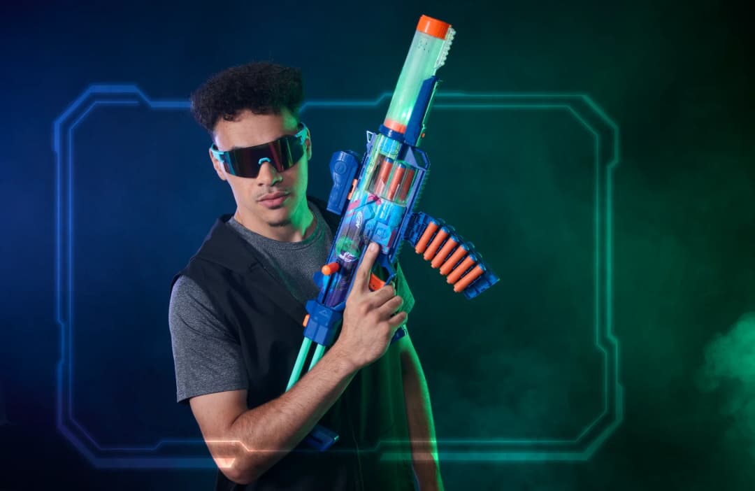 Kid playing with NERF Loadout blaster image